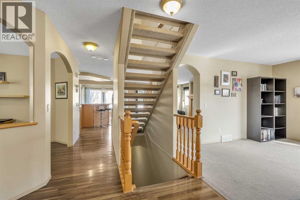 Single Family House for Sale in  Everwillow Close SW Evergreen Calgary 