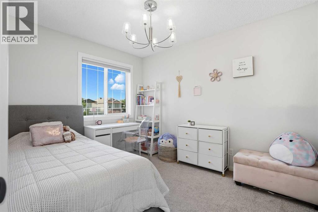 Single Family House for Sale in  Everoak Drive SW Evergreen Calgary 