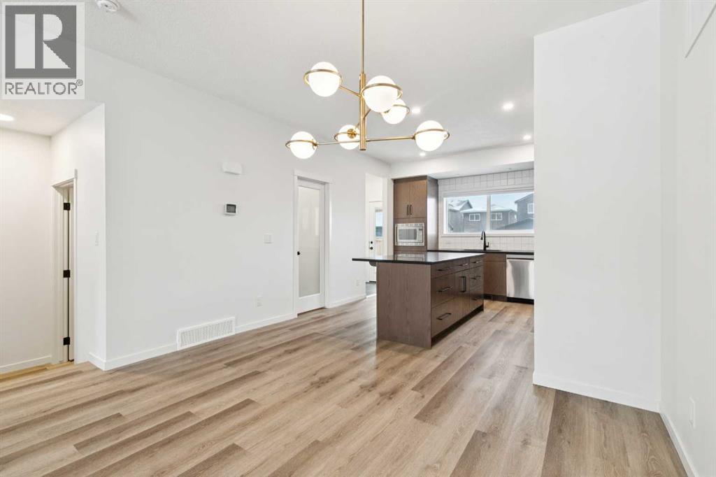 Single Family House for Sale in  Belmont Villas SW Belmont Calgary 