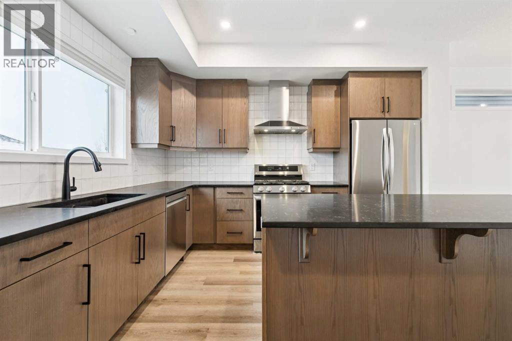 Single Family House for Sale in  Belmont Villas SW Belmont Calgary 