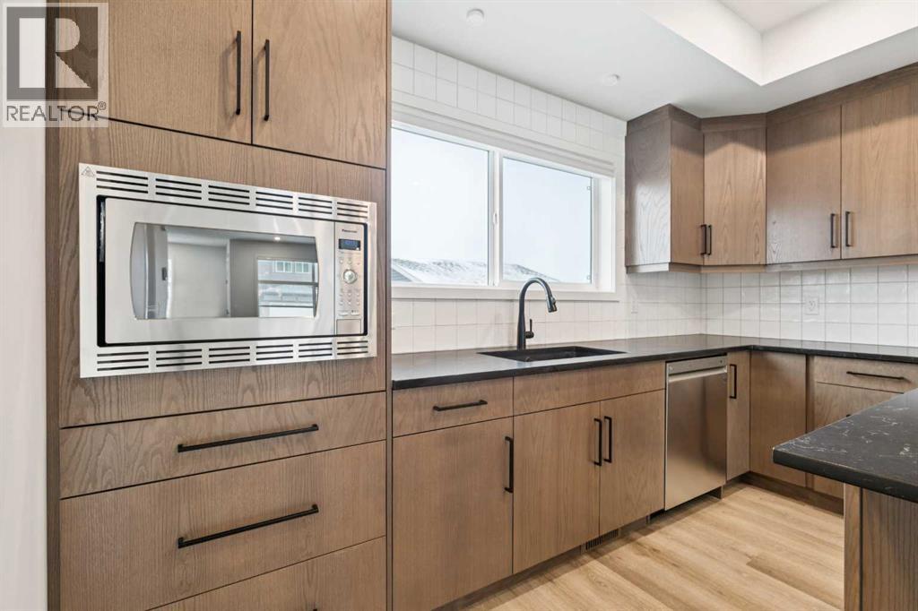 Single Family House for Sale in  Belmont Villas SW Belmont Calgary 