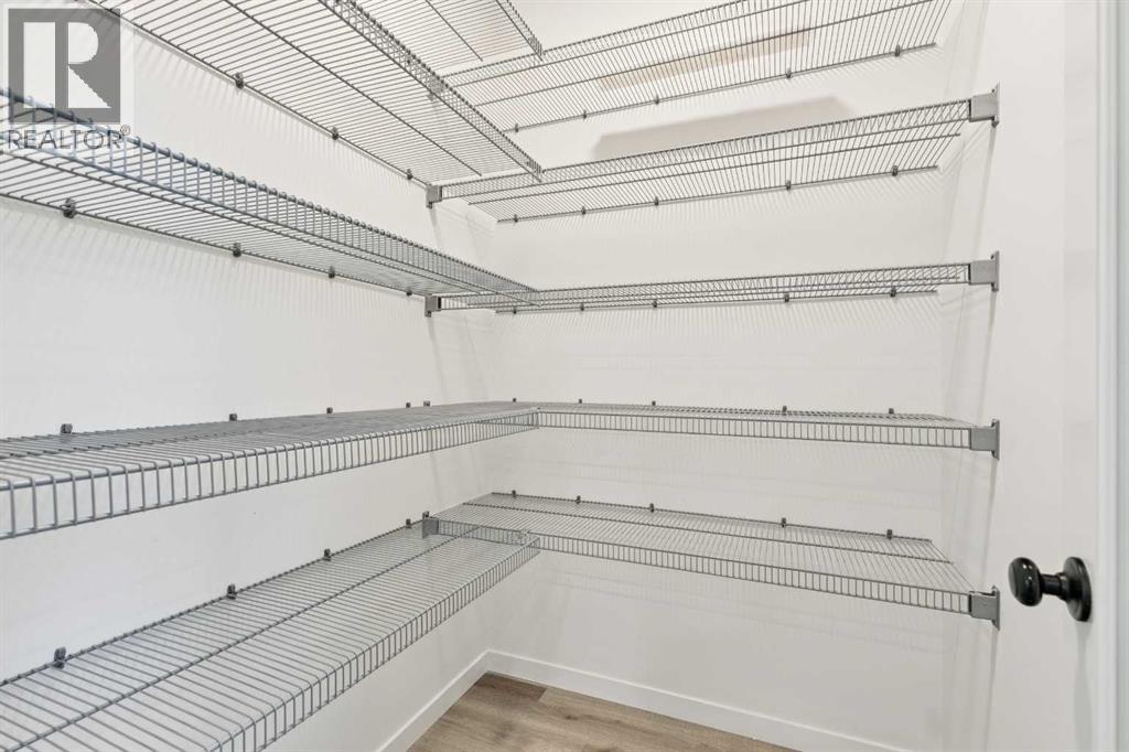 Single Family House for Sale in  Belmont Villas SW Belmont Calgary 