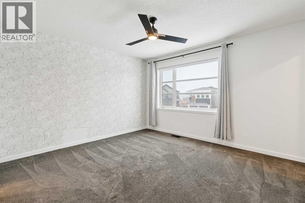 Single Family House for Sale in  Belmont Villas SW Belmont Calgary 