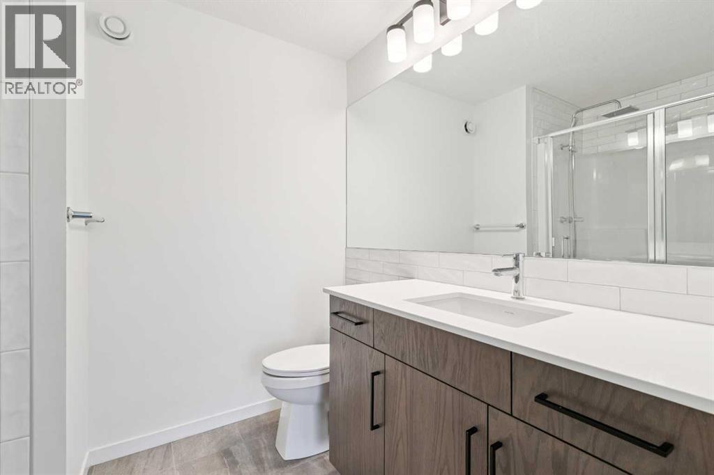 Single Family House for Sale in  Belmont Villas SW Belmont Calgary 