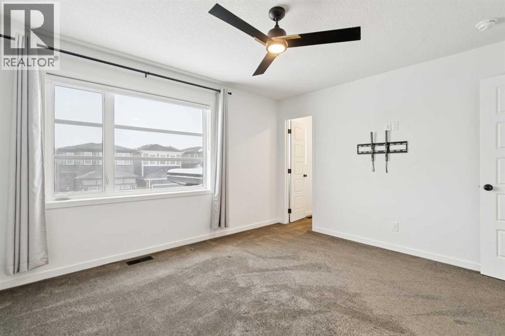 Single Family House for Sale in  Belmont Villas SW Belmont Calgary 