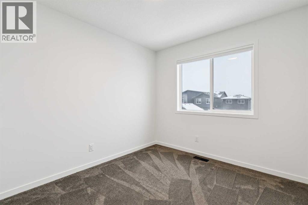 Single Family House for Sale in  Belmont Villas SW Belmont Calgary 