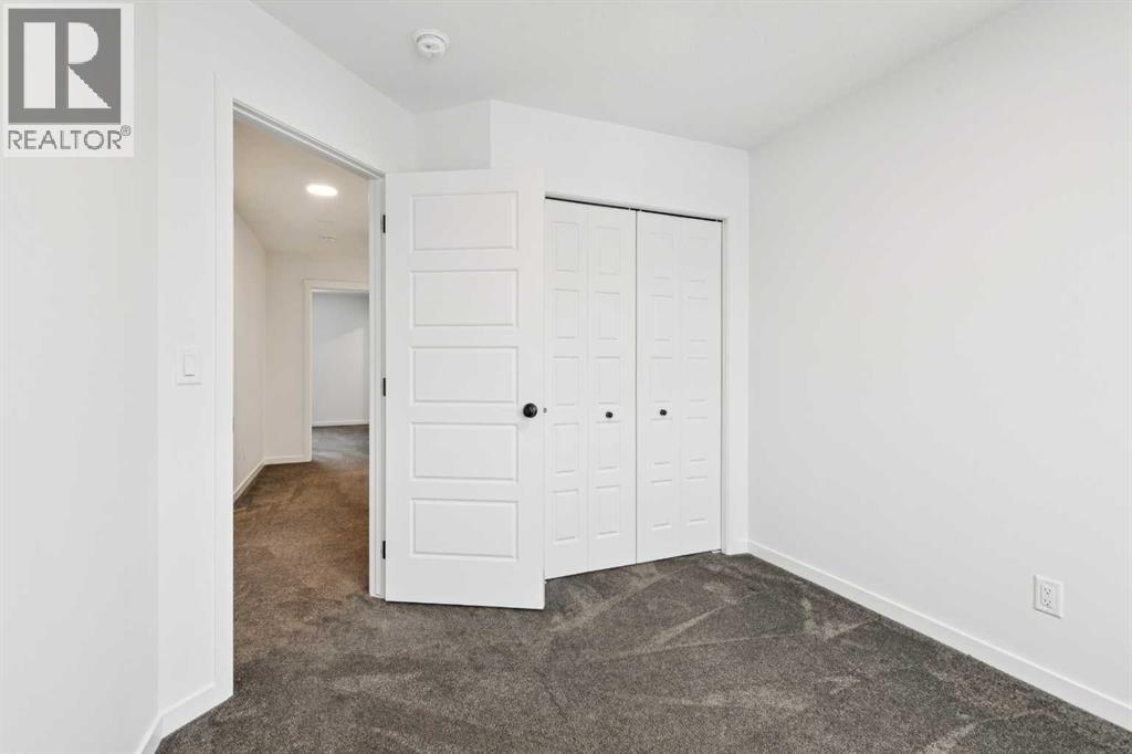 Single Family House for Sale in  Belmont Villas SW Belmont Calgary 