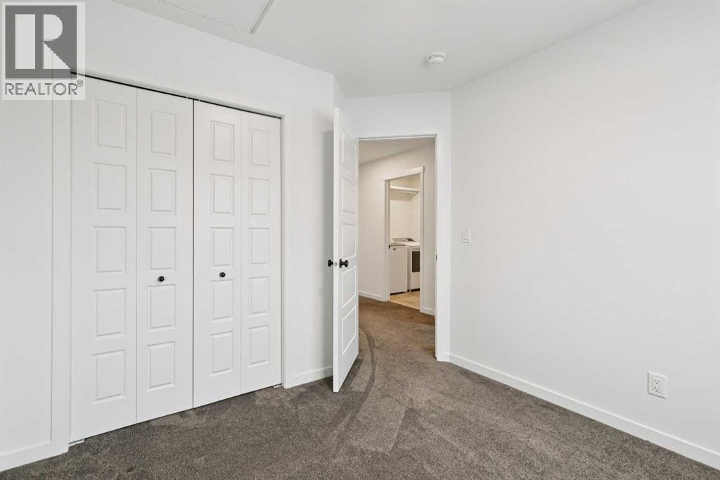 Single Family House for Sale in  Belmont Villas SW Belmont Calgary 