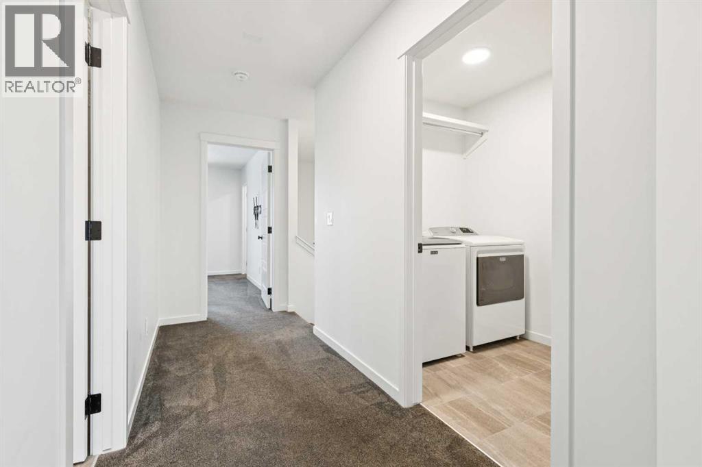 Single Family House for Sale in  Belmont Villas SW Belmont Calgary 