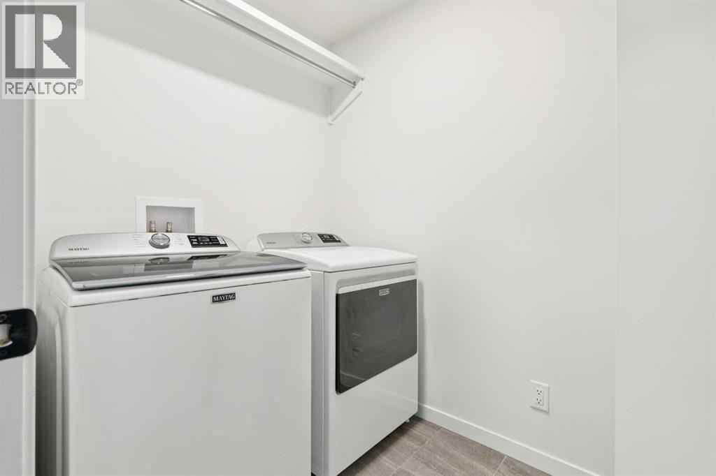 Single Family House for Sale in  Belmont Villas SW Belmont Calgary 