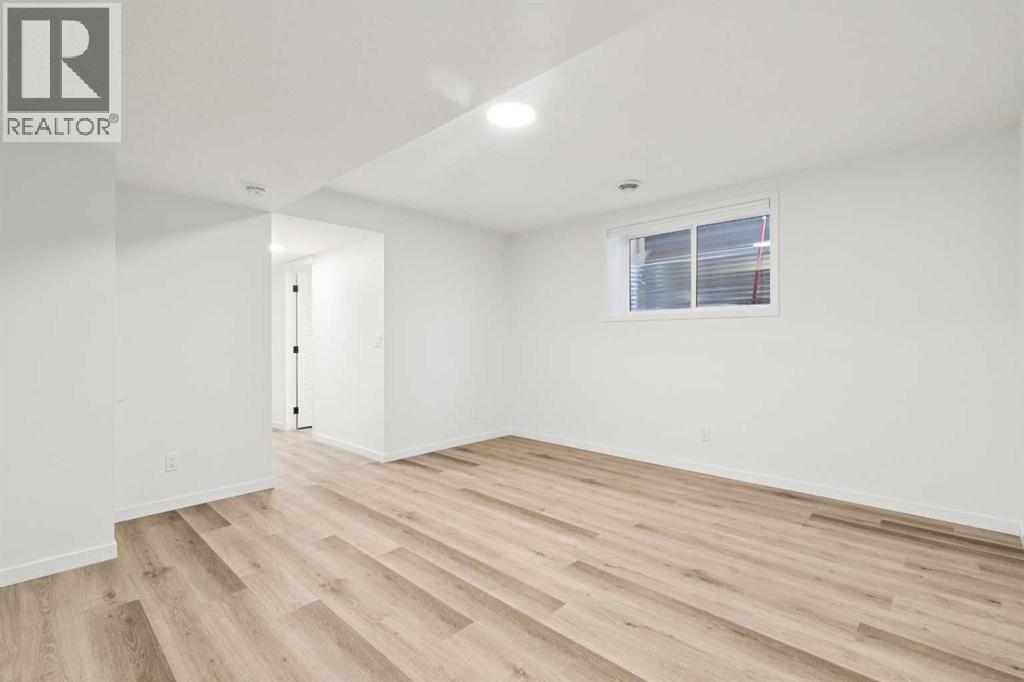 Single Family House for Sale in  Belmont Villas SW Belmont Calgary 