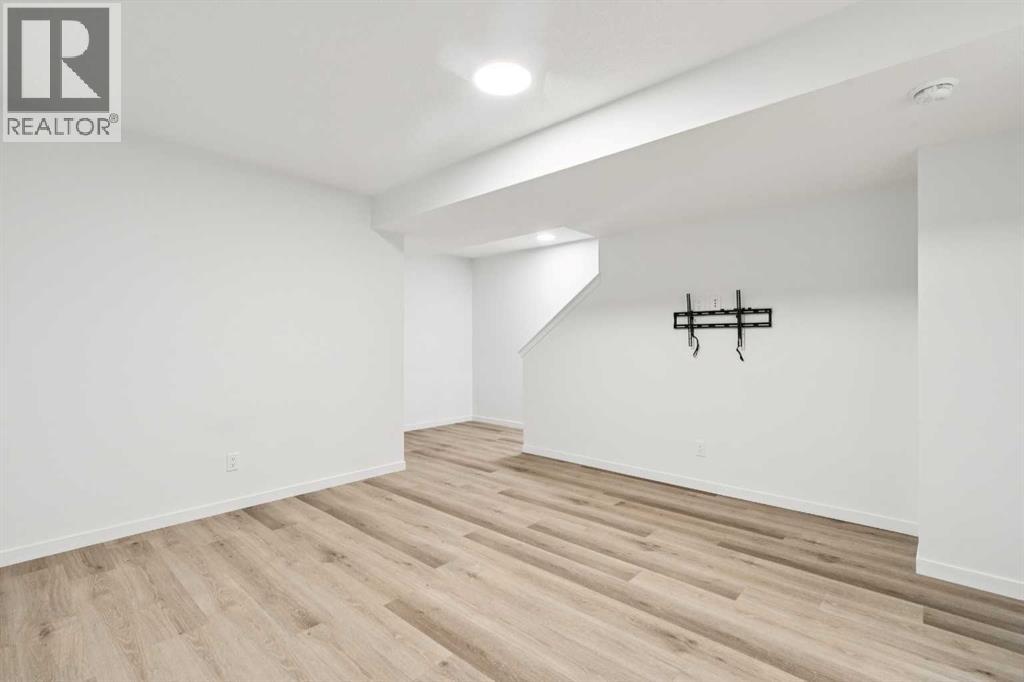 Single Family House for Sale in  Belmont Villas SW Belmont Calgary 