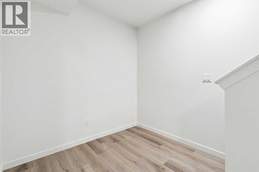 Single Family House for Sale in  Belmont Villas SW Belmont Calgary 