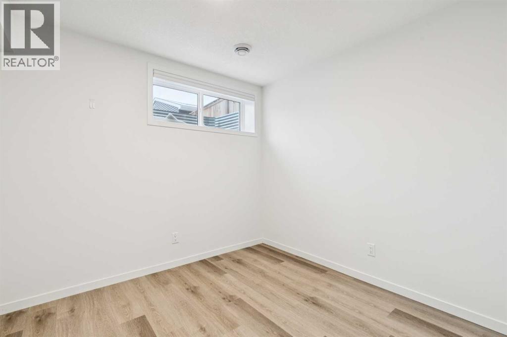 Single Family House for Sale in  Belmont Villas SW Belmont Calgary 