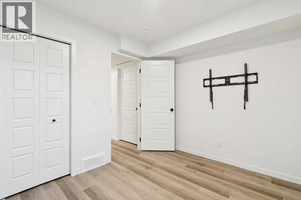 Single Family House for Sale in  Belmont Villas SW Belmont Calgary 