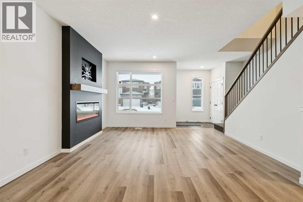 Single Family House for Sale in  Belmont Villas SW Belmont Calgary 