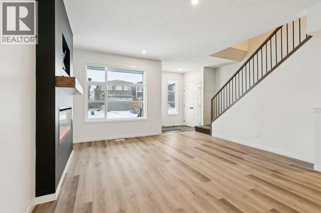 Single Family House for Sale in  Belmont Villas SW Belmont Calgary 