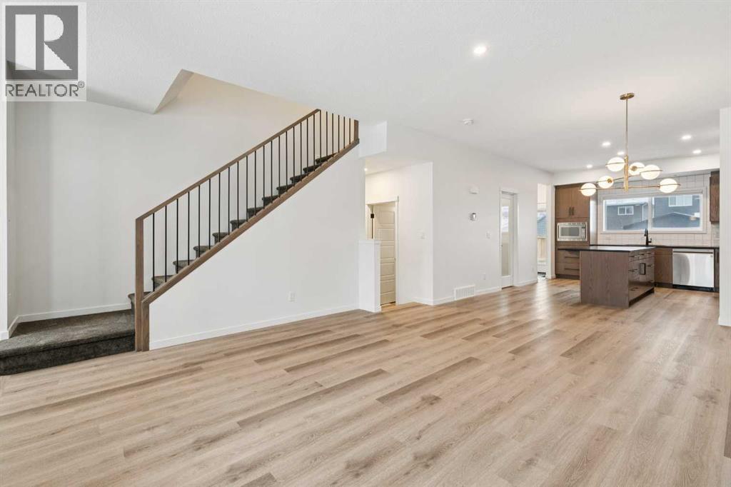 Single Family House for Sale in  Belmont Villas SW Belmont Calgary 