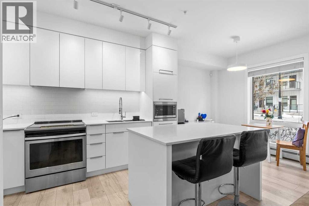 Single Family House Multi-level for Sale in    Street NW University District Calgary 