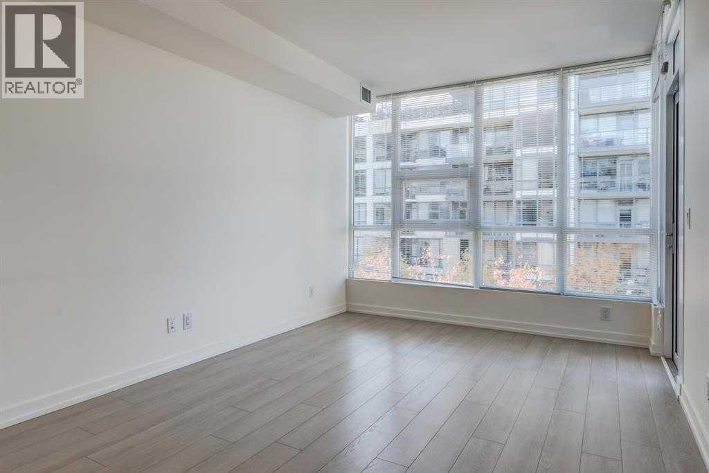 Single Family House for Sale in   Waterfront Mews SW Chinatown Calgary 