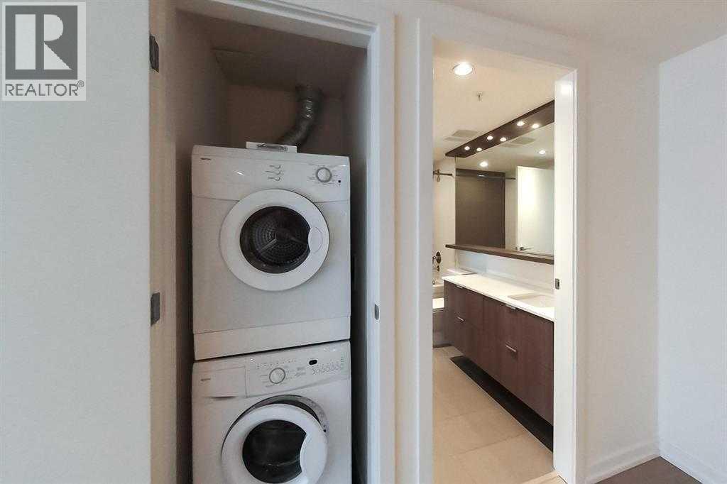 Single Family House for Sale in   Waterfront Mews SW Chinatown Calgary 