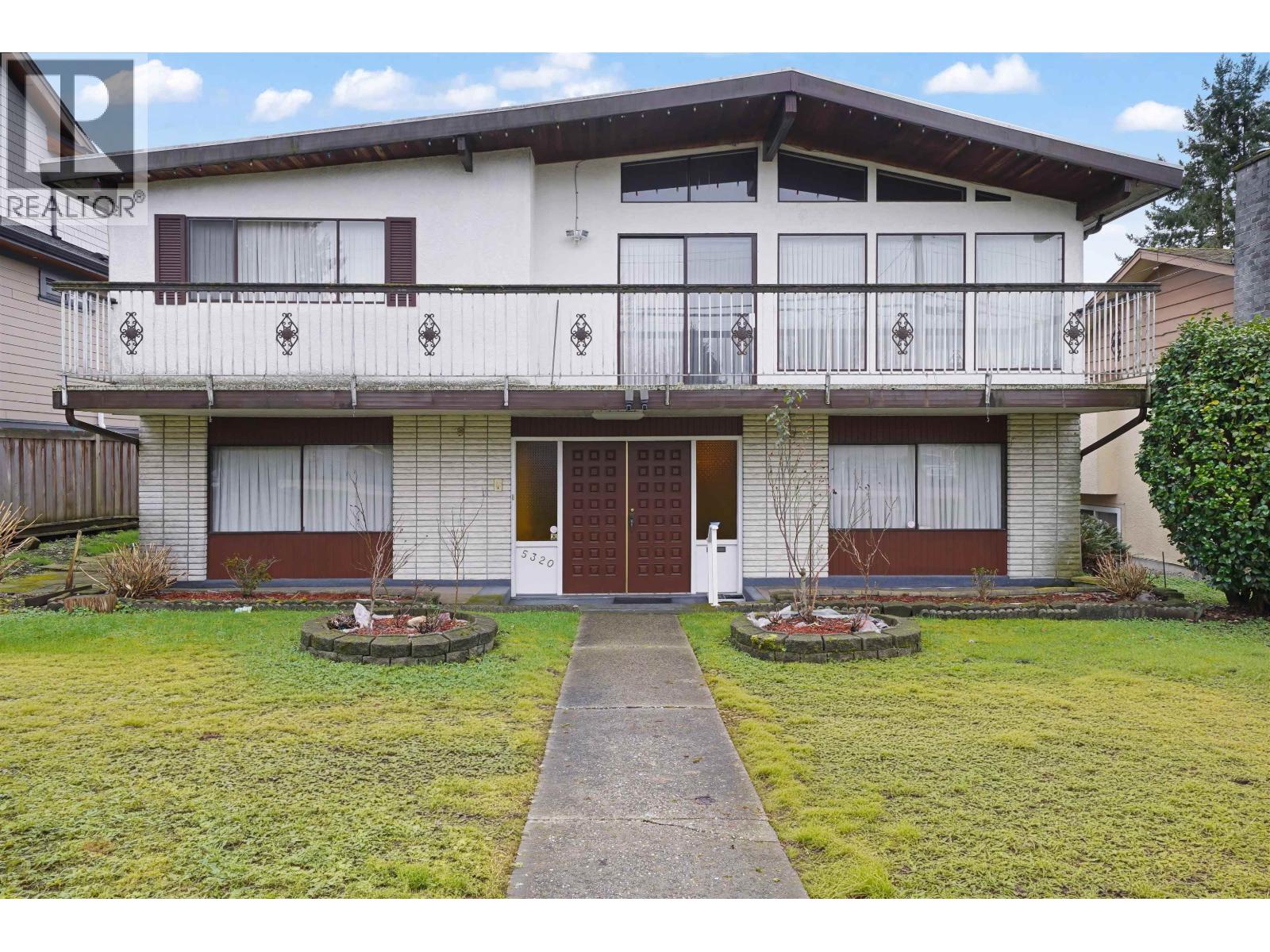 5320 SPRUCE Street - photo 2