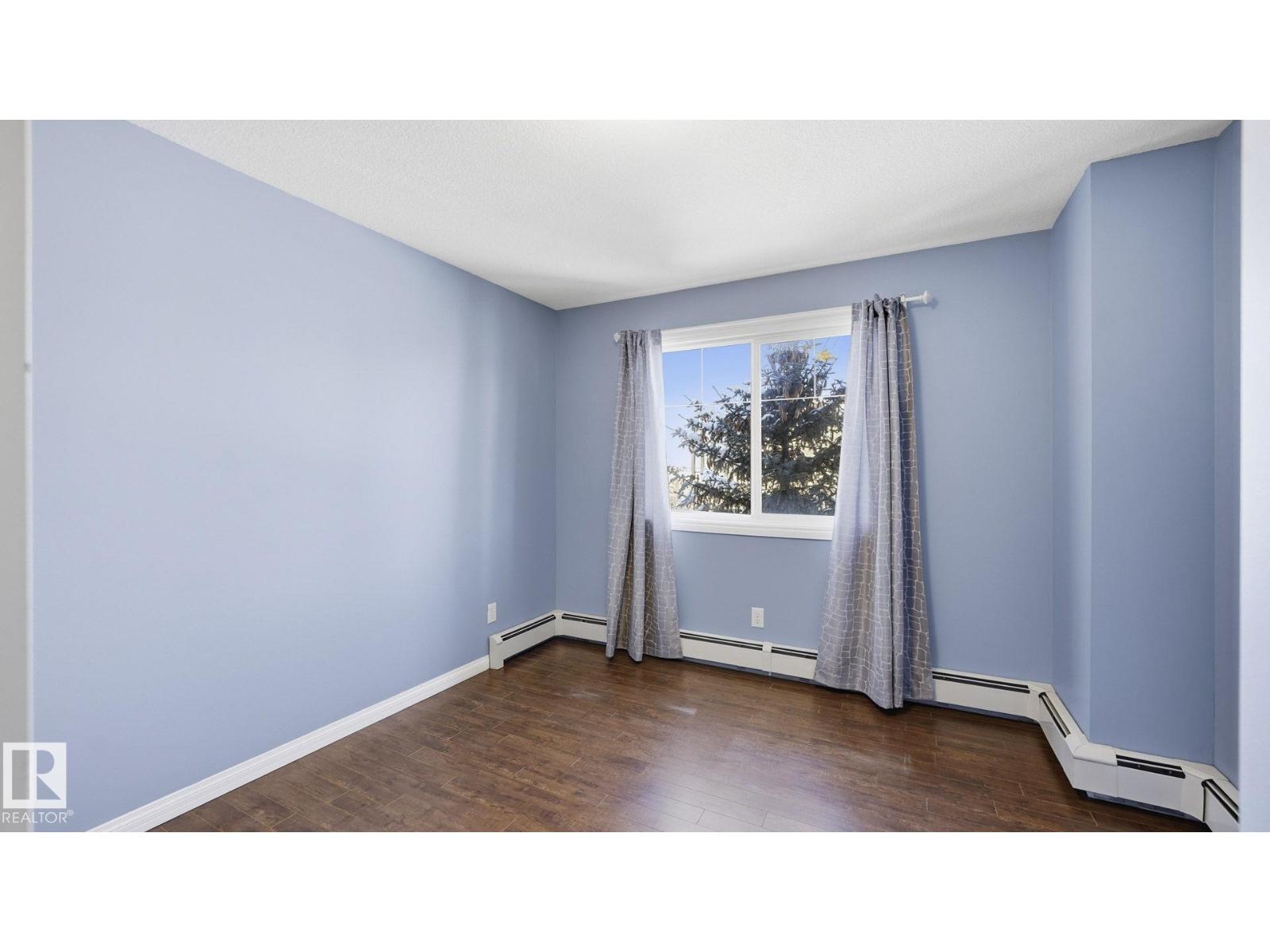 #303 1204 156 ST NW - 18