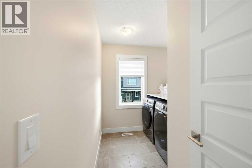 Single Family House for Sale in  Carringham Road Carrington Calgary 