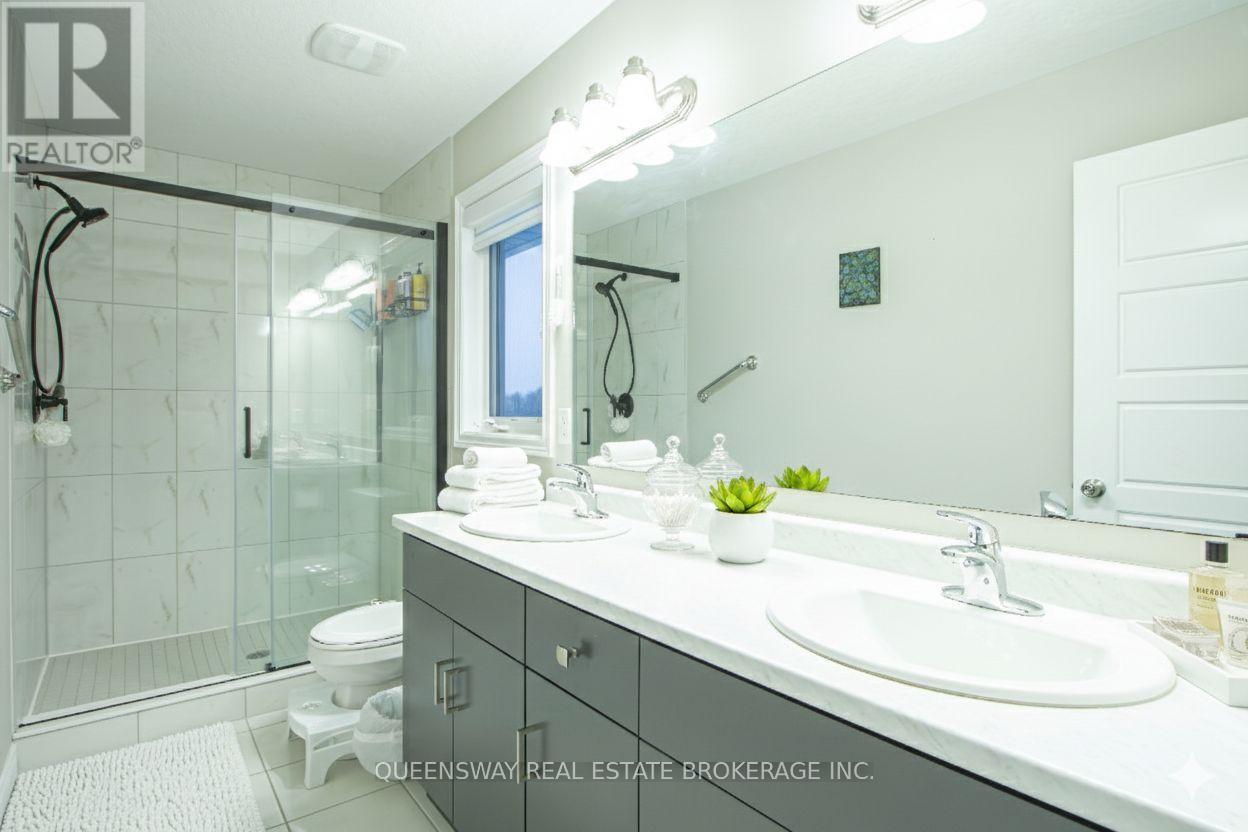 Primary Ensuite with Glass Shower & Double Vanity