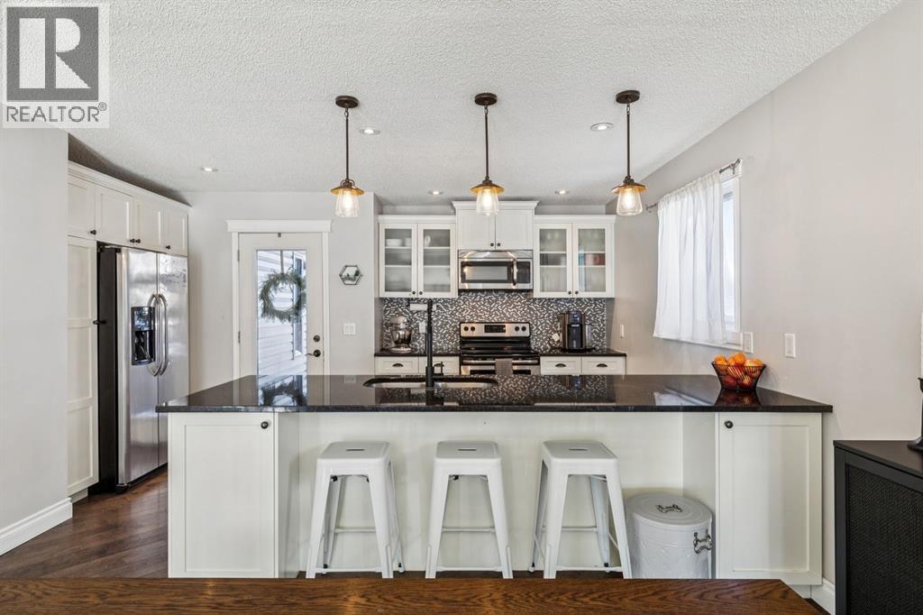 Single Family House Bi-level for Sale in  Riverglen Way SE Riverbend Calgary 