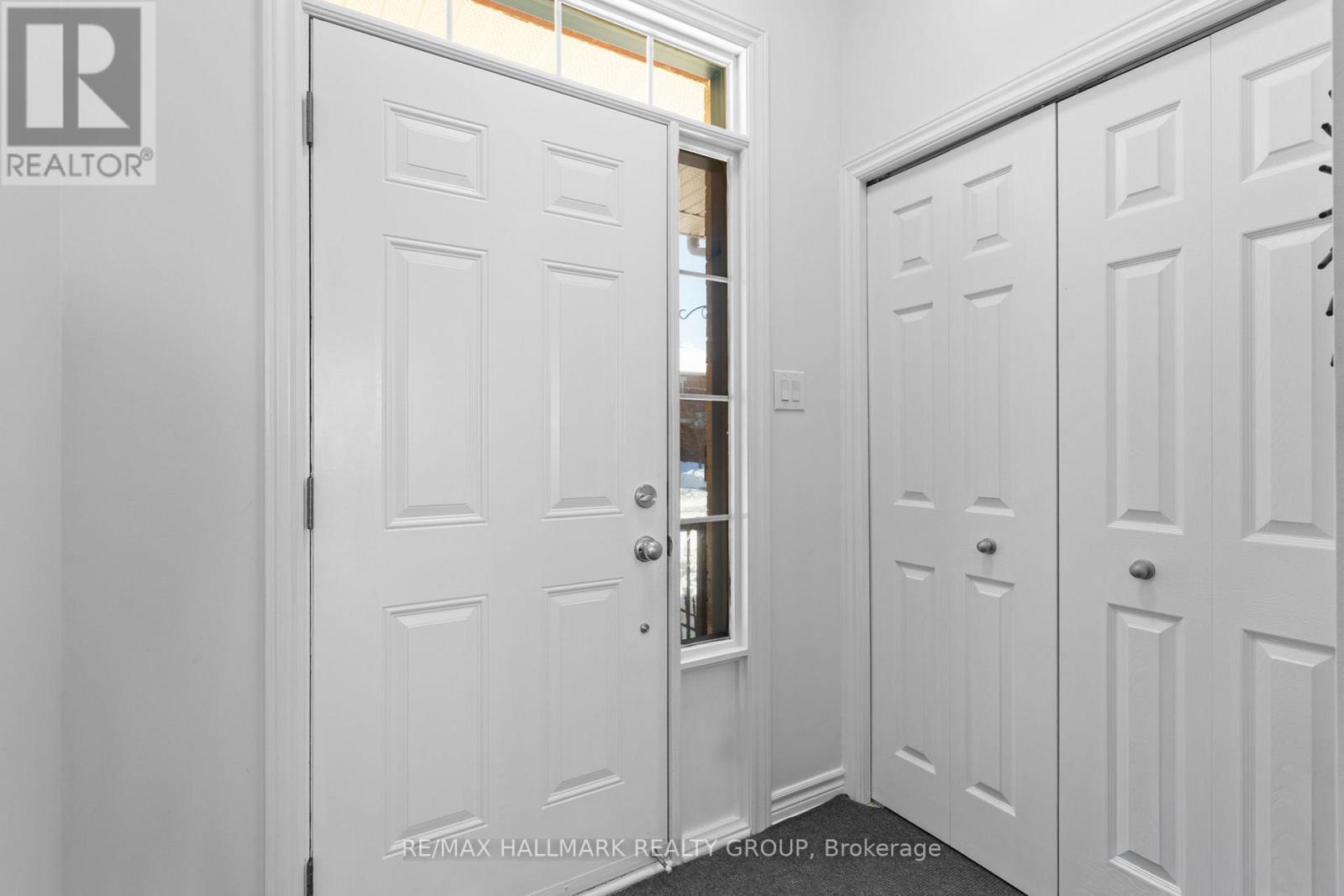 Bright foyer with closet storage