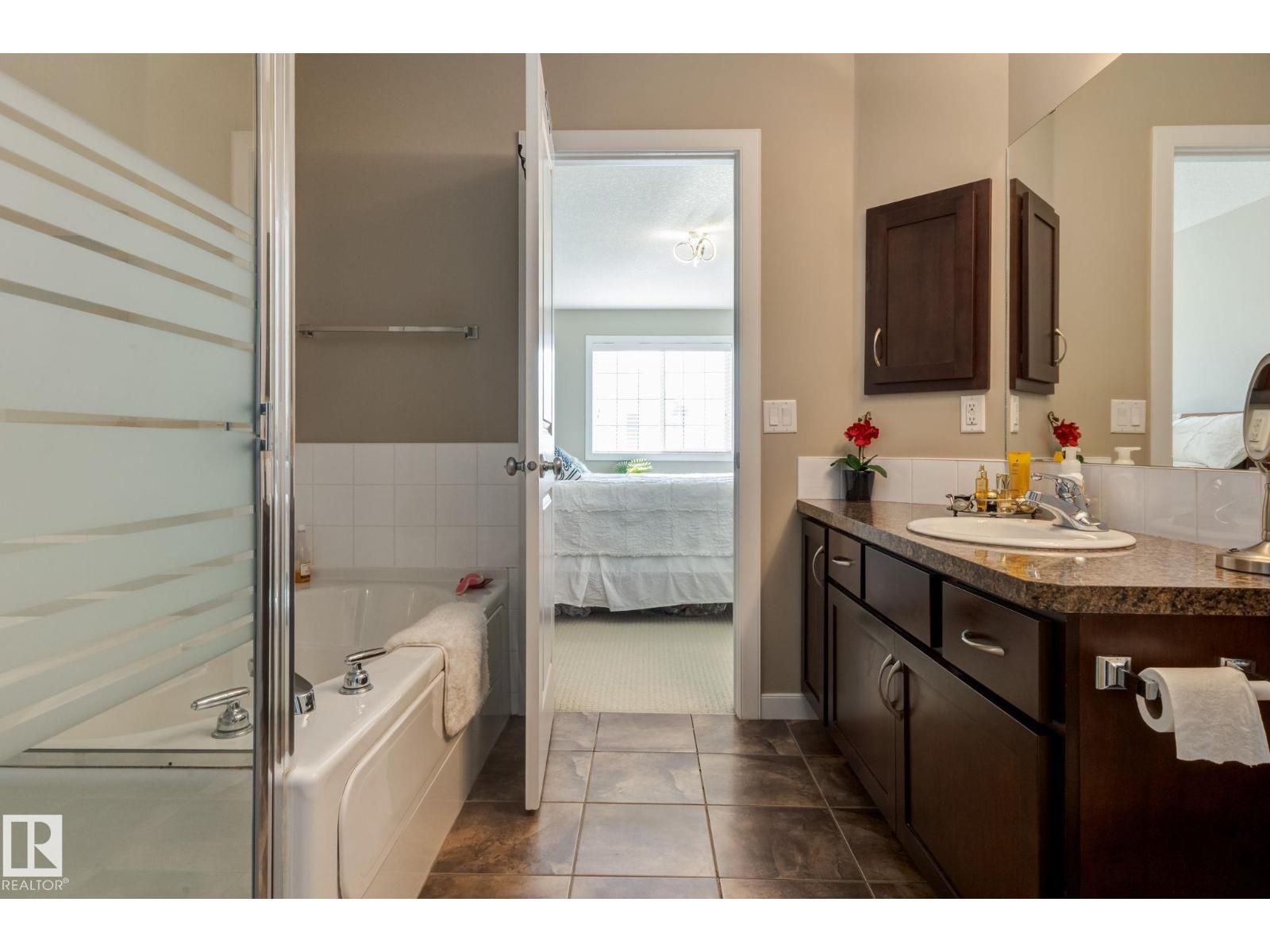 #91 7293 SOUTH TERWILLEGAR DR NW - 16