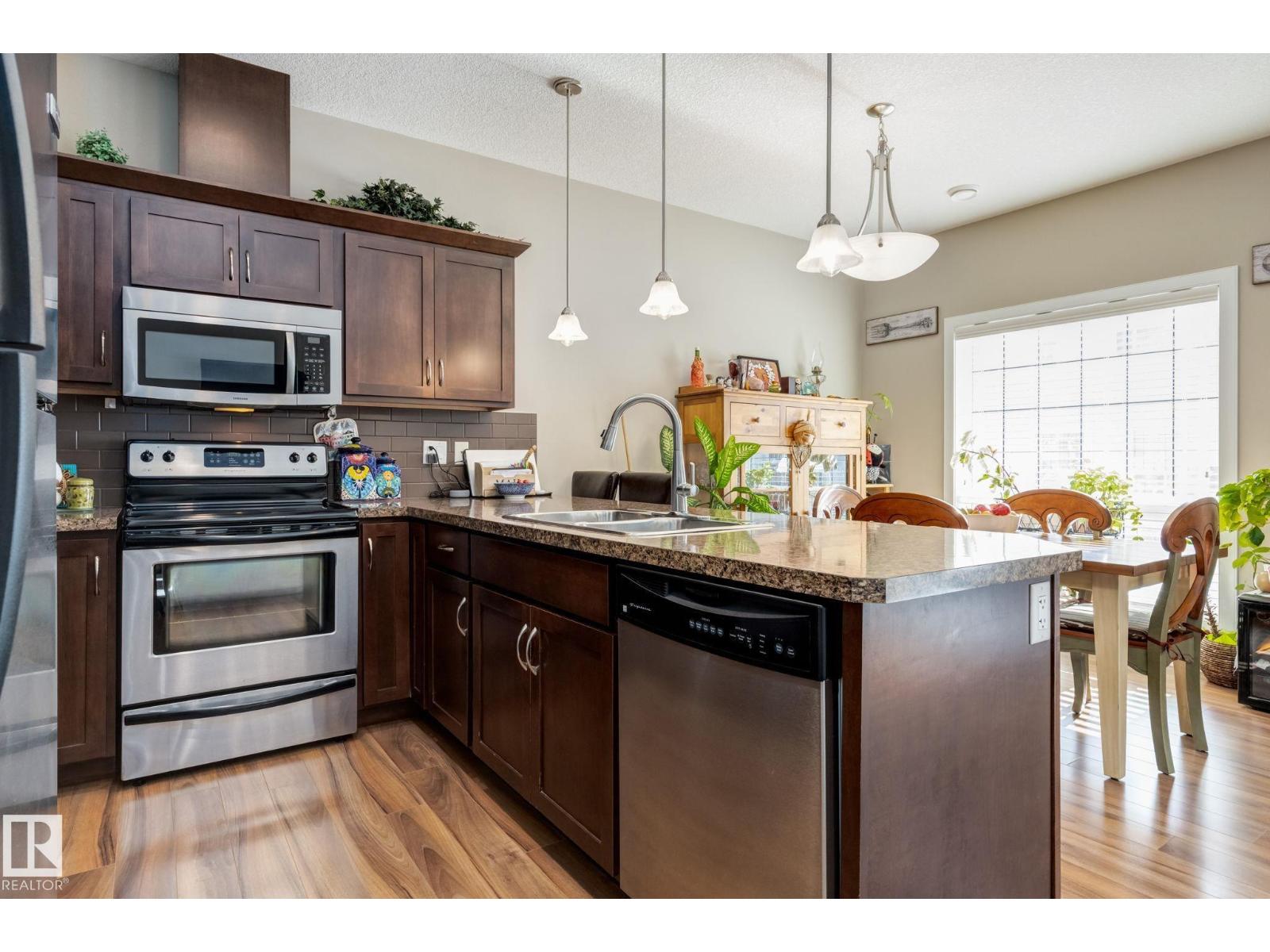 #91 7293 SOUTH TERWILLEGAR DR NW - 2
