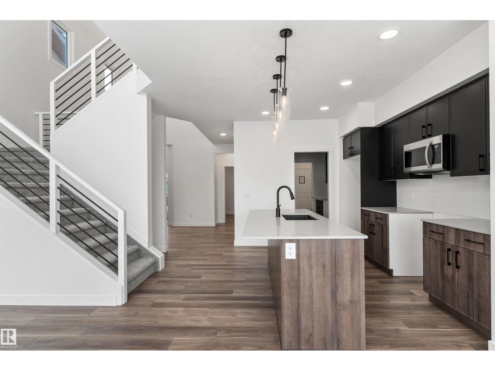 
          931 18 AV NW
            <br/>
            <span>Edmonton</span>
            , 
            <span>AB</span>
             <span>T6T2X3</span>
         - Photo 13