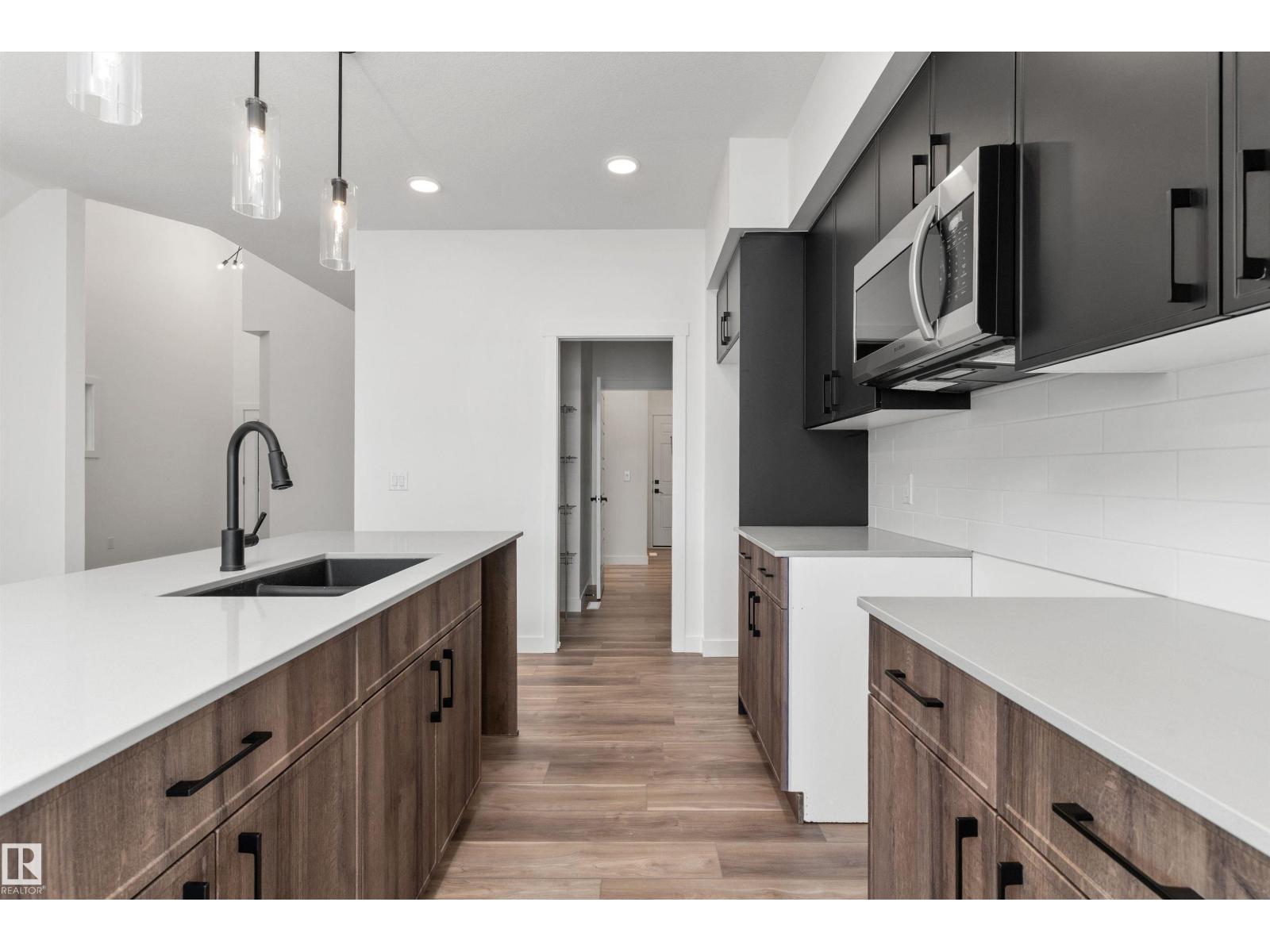 
          931 18 AV NW
            <br/>
            <span>Edmonton</span>
            , 
            <span>AB</span>
             <span>T6T2X3</span>
         - Photo 21