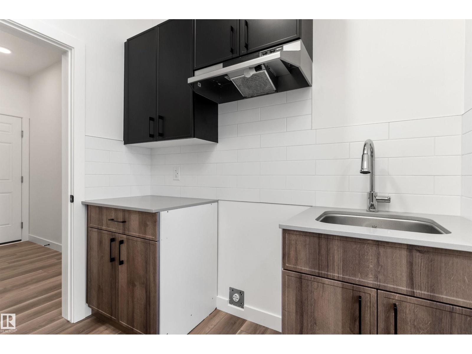 
          931 18 AV NW
            <br/>
            <span>Edmonton</span>
            , 
            <span>AB</span>
             <span>T6T2X3</span>
         - Photo 7