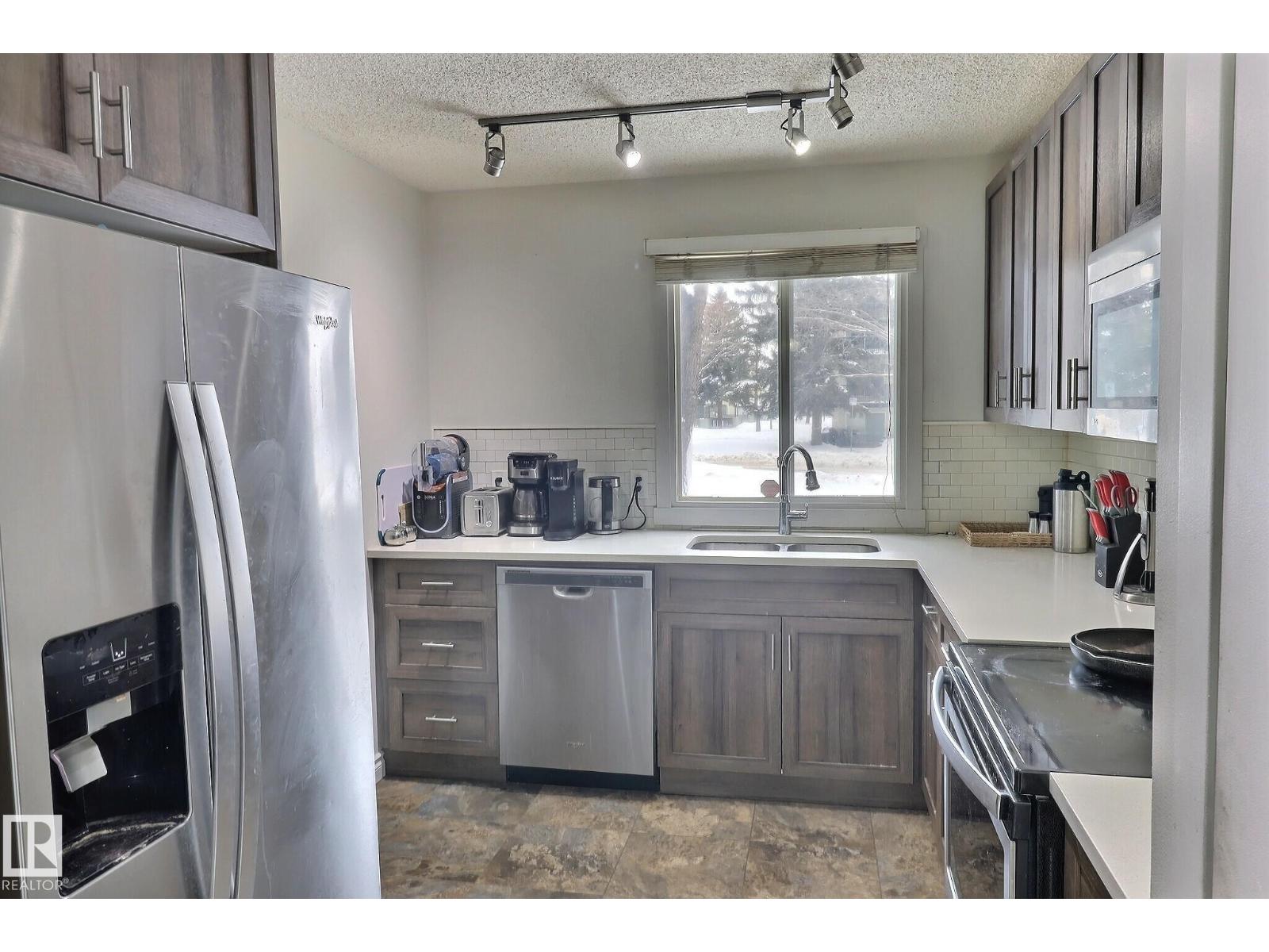 
          18285 84 AV NW
            <br/>
            <span>Edmonton</span>
            , 
            <span>AB</span>
             <span>T5T1T7</span>
        