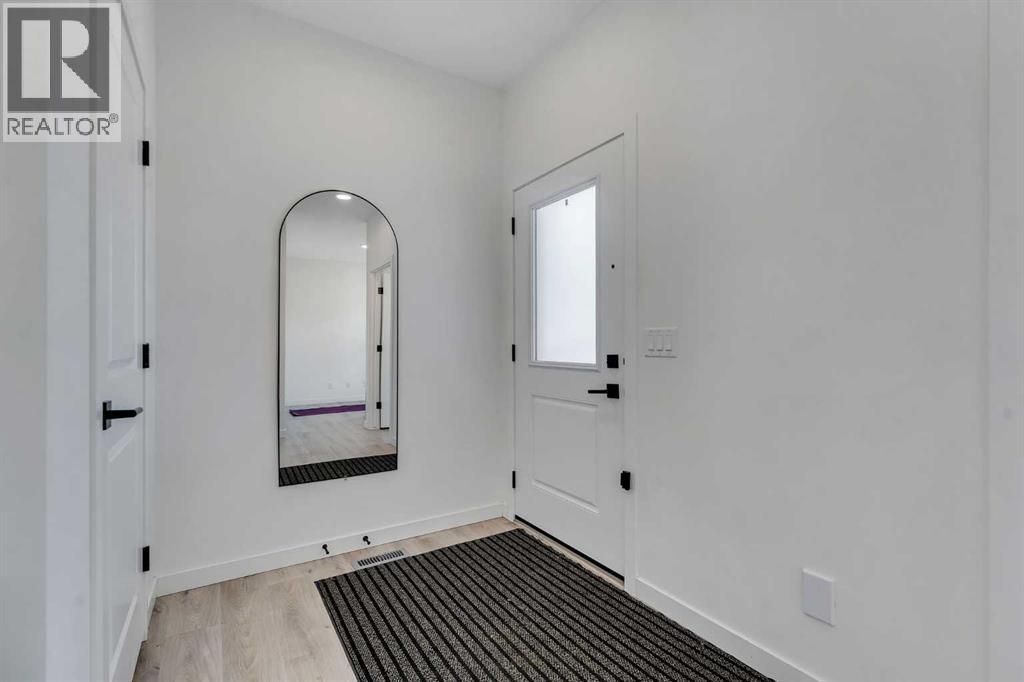 392 Lawthorn Way - Photo 5 of 40, Airdrie, Alberta