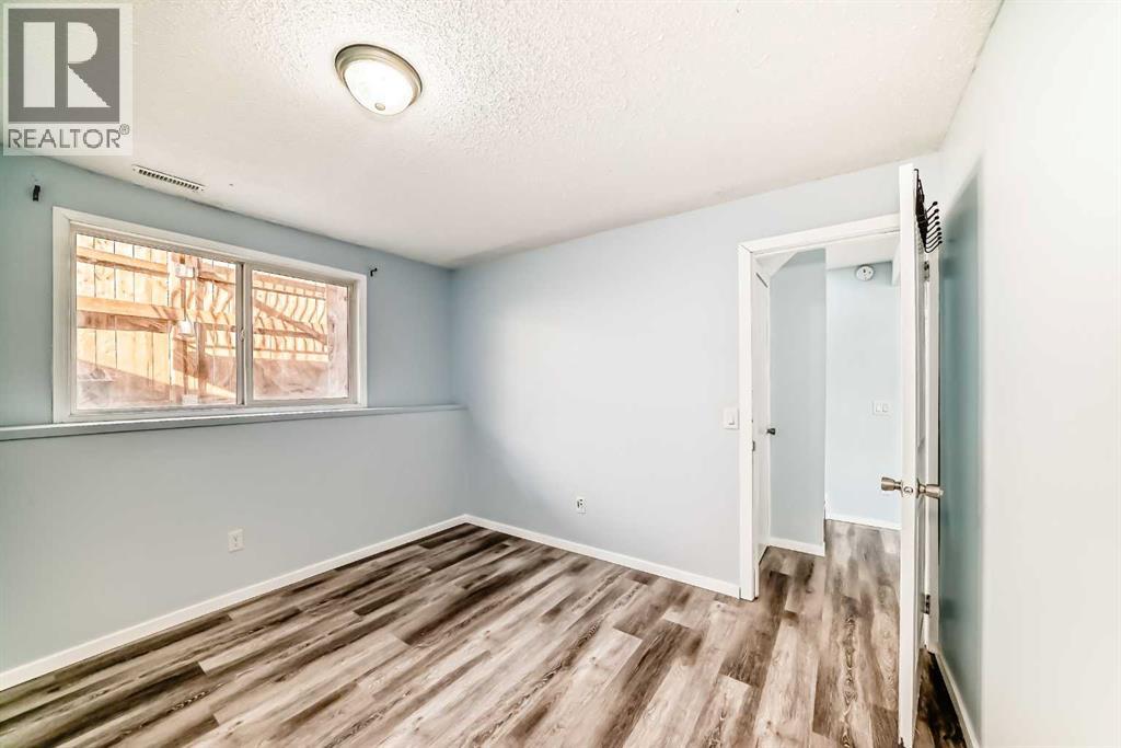 Single Family House Bi-level for Sale in F Pinehill Road NE Pineridge Calgary 