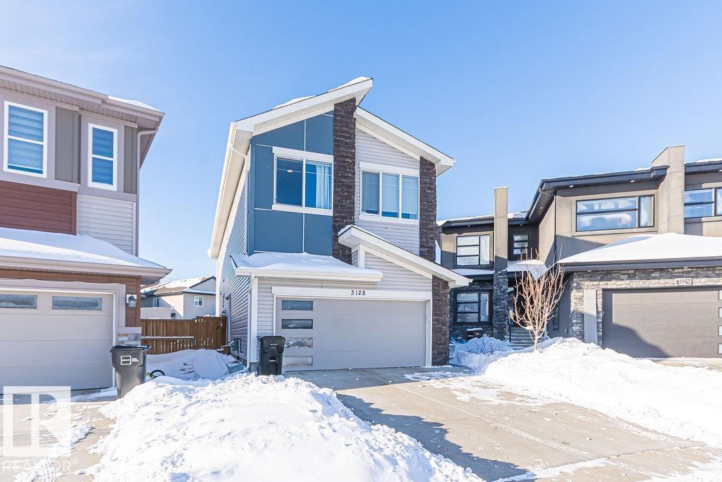 3128 13 AV NW - 75