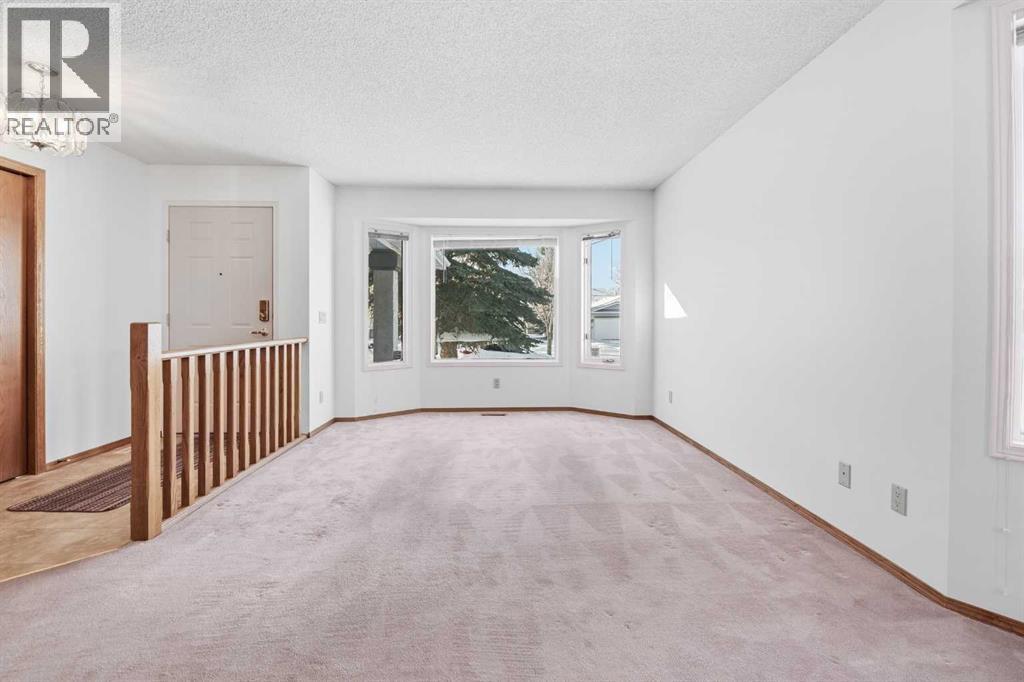 Single Family House Bungalow for Sale in  Arbour Cliff Close NW Arbour Lake Calgary 