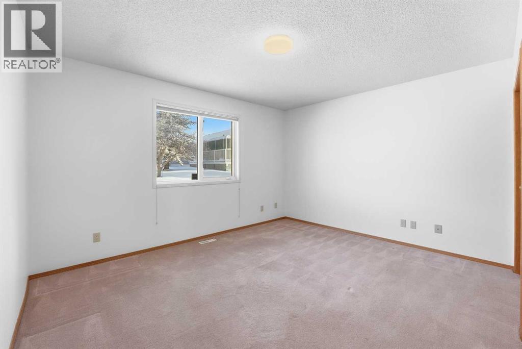 Single Family House Bungalow for Sale in  Arbour Cliff Close NW Arbour Lake Calgary 