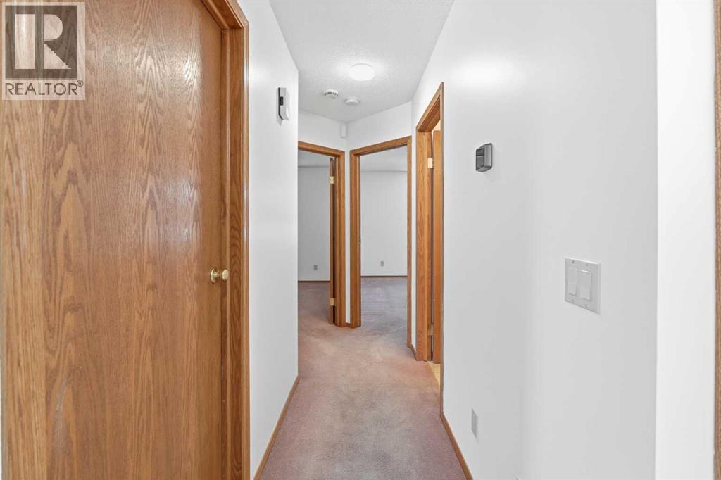 Single Family House Bungalow for Sale in  Arbour Cliff Close NW Arbour Lake Calgary 