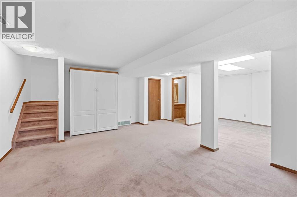 Single Family House Bungalow for Sale in  Arbour Cliff Close NW Arbour Lake Calgary 