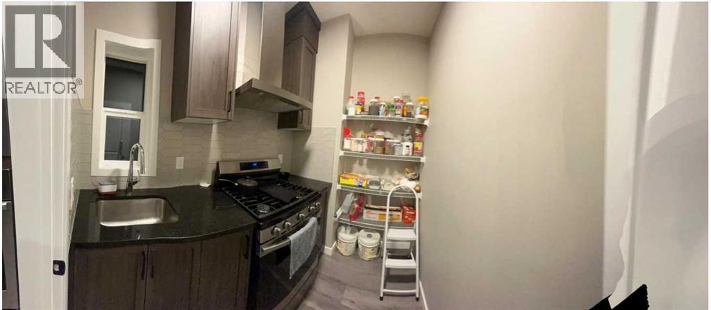 Single Family House for Sale in  Lucas Gardens NW Livingston Calgary 