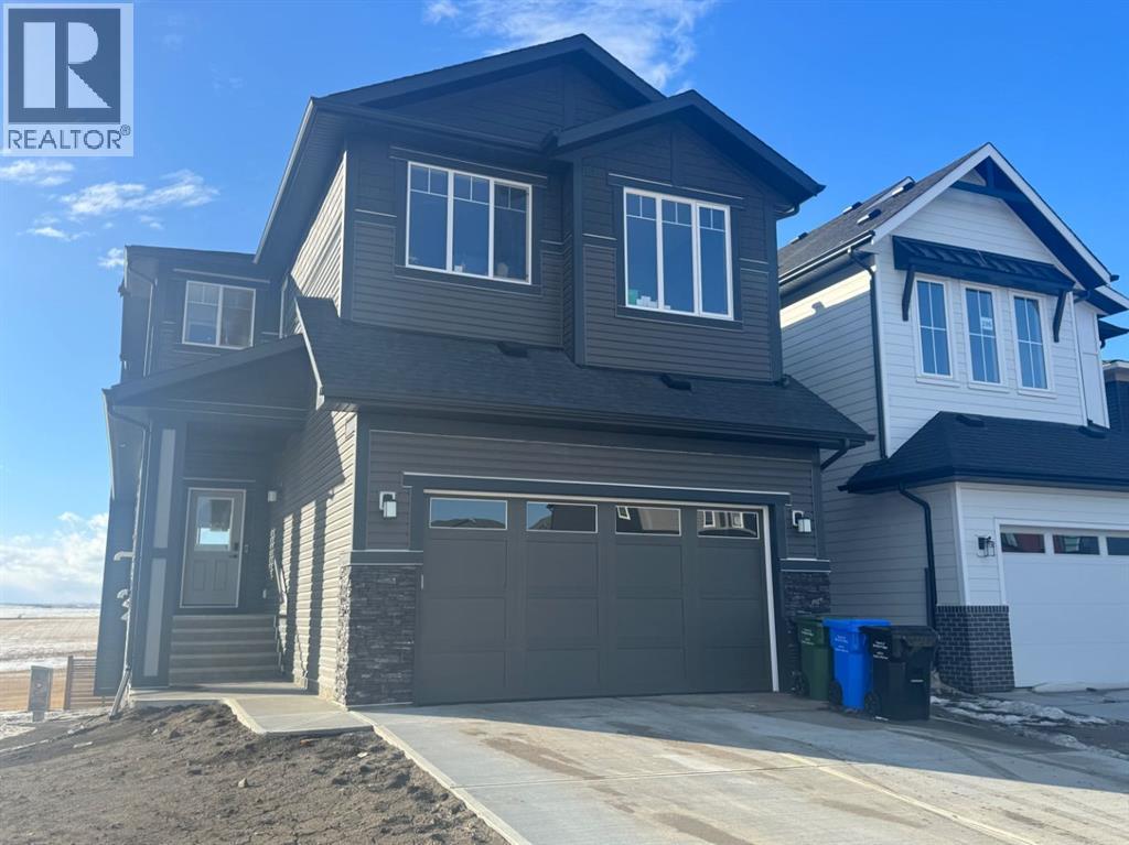 Single Family House for Sale in  Lucas Gardens NW Livingston Calgary 
