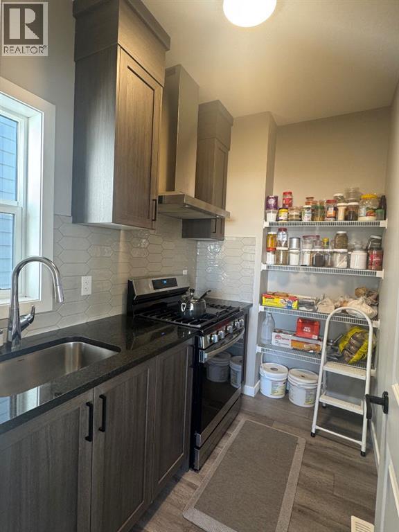 Single Family House for Sale in  Lucas Gardens NW Livingston Calgary 