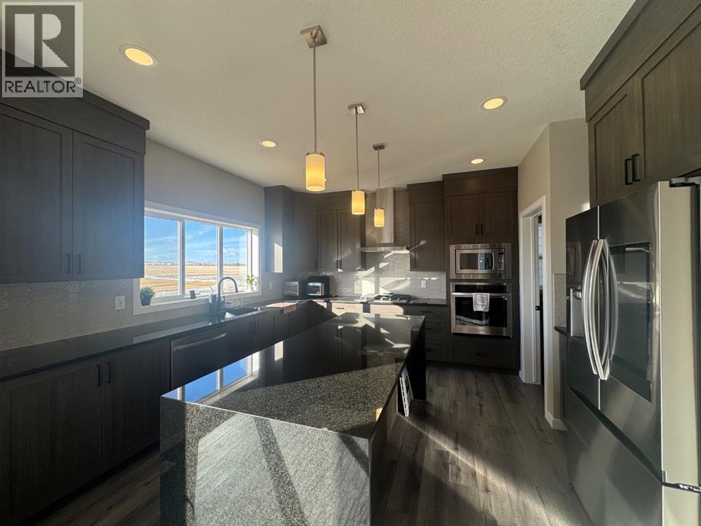 Single Family House for Sale in  Lucas Gardens NW Livingston Calgary 