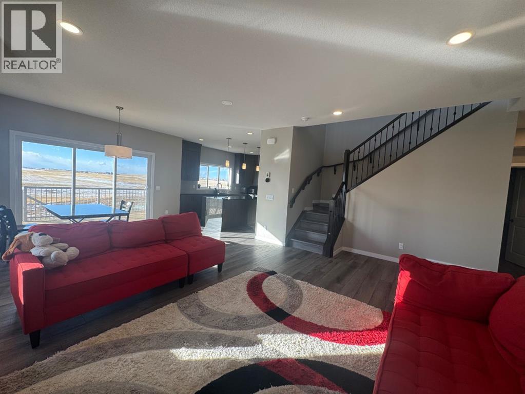 Single Family House for Sale in  Lucas Gardens NW Livingston Calgary 