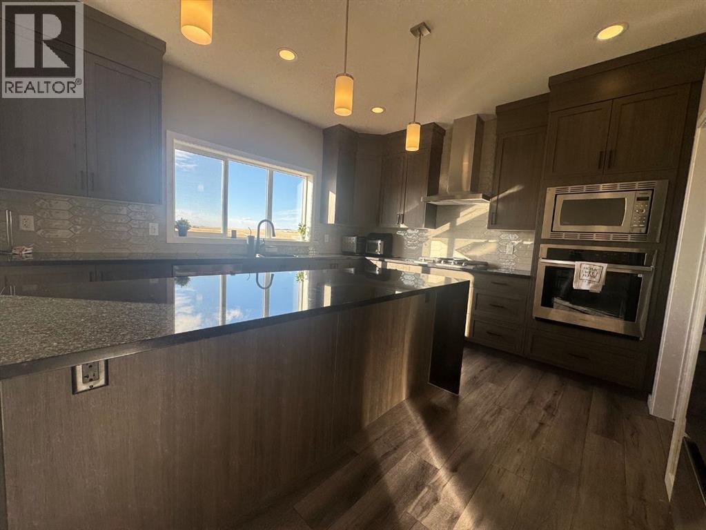 Single Family House for Sale in  Lucas Gardens NW Livingston Calgary 